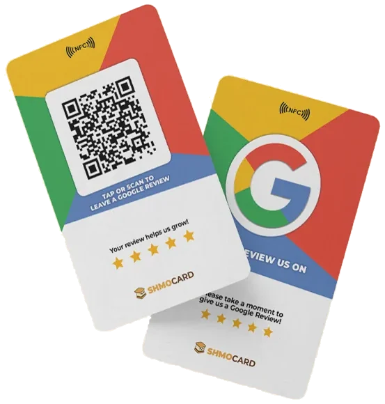 Shmo Card review tap card, front and back, lying on a freshly mowed lawn
